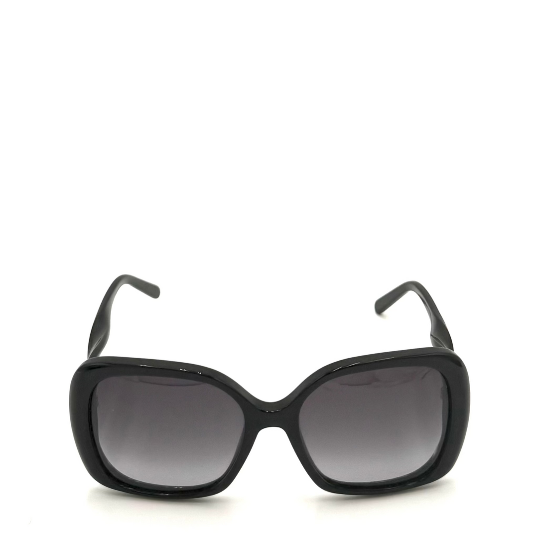 Black cat-eye sunglasses with dark gray gradient lenses, shown from the front on a white background.