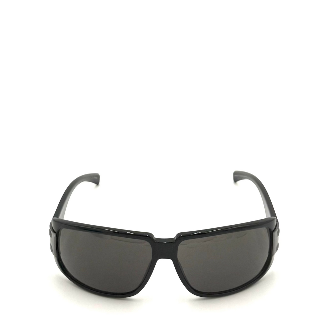 Black wrap-around sunglasses with dark tinted lenses, shown from the front on a white background.