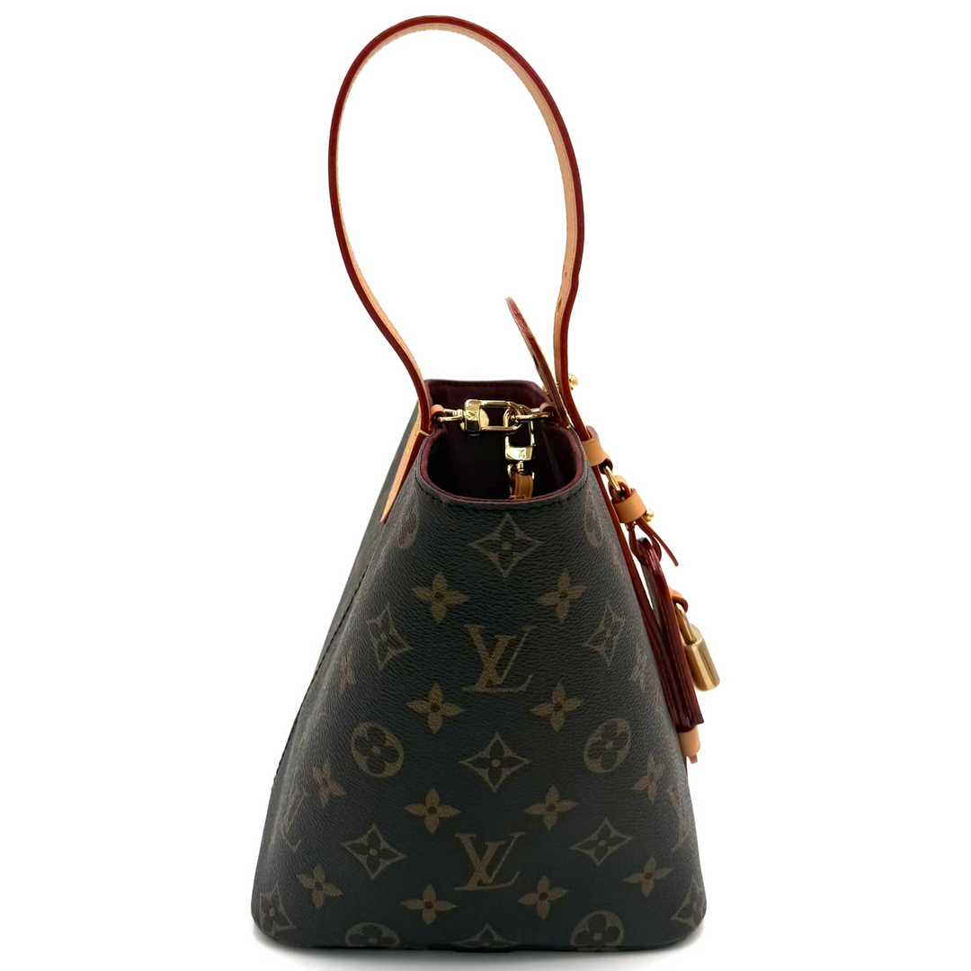 Louis Vuitton monogram canvas shoulder bag in dark brown with tan leather trim and gold-tone hardware, shown on a plain white background.