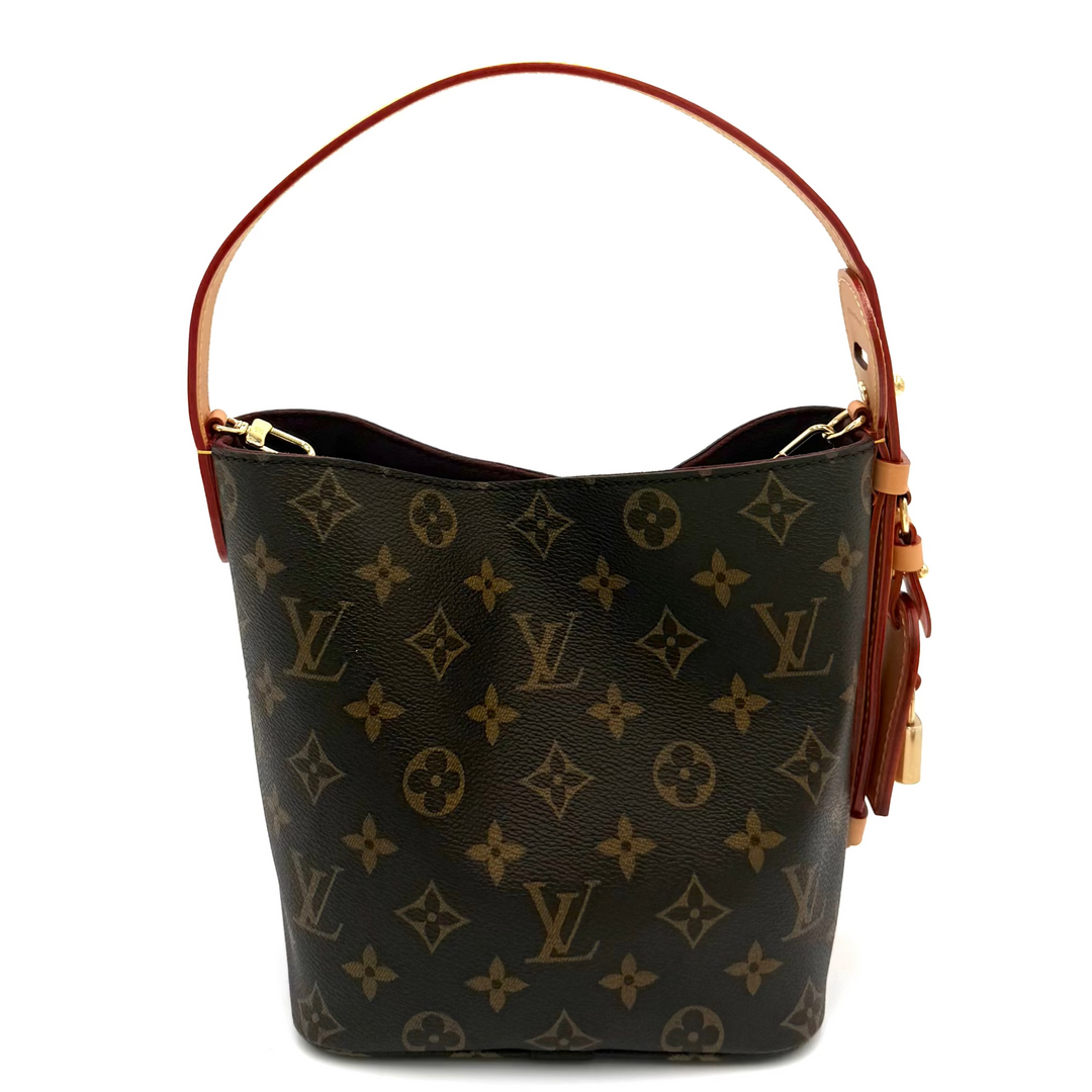 Louis Vuitton monogram canvas shoulder bag with brown leather trim and gold-tone hardware, shown on a plain white background.