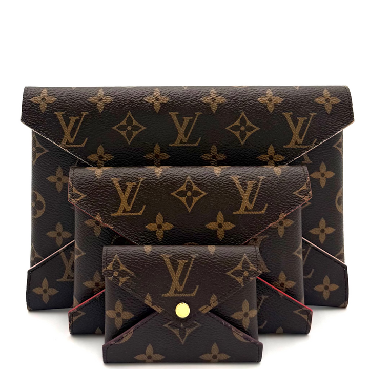 Three Louis Vuitton monogram envelope wallets in dark brown coated canvas with gold-tone hardware, arranged in a nested stack on a white background.