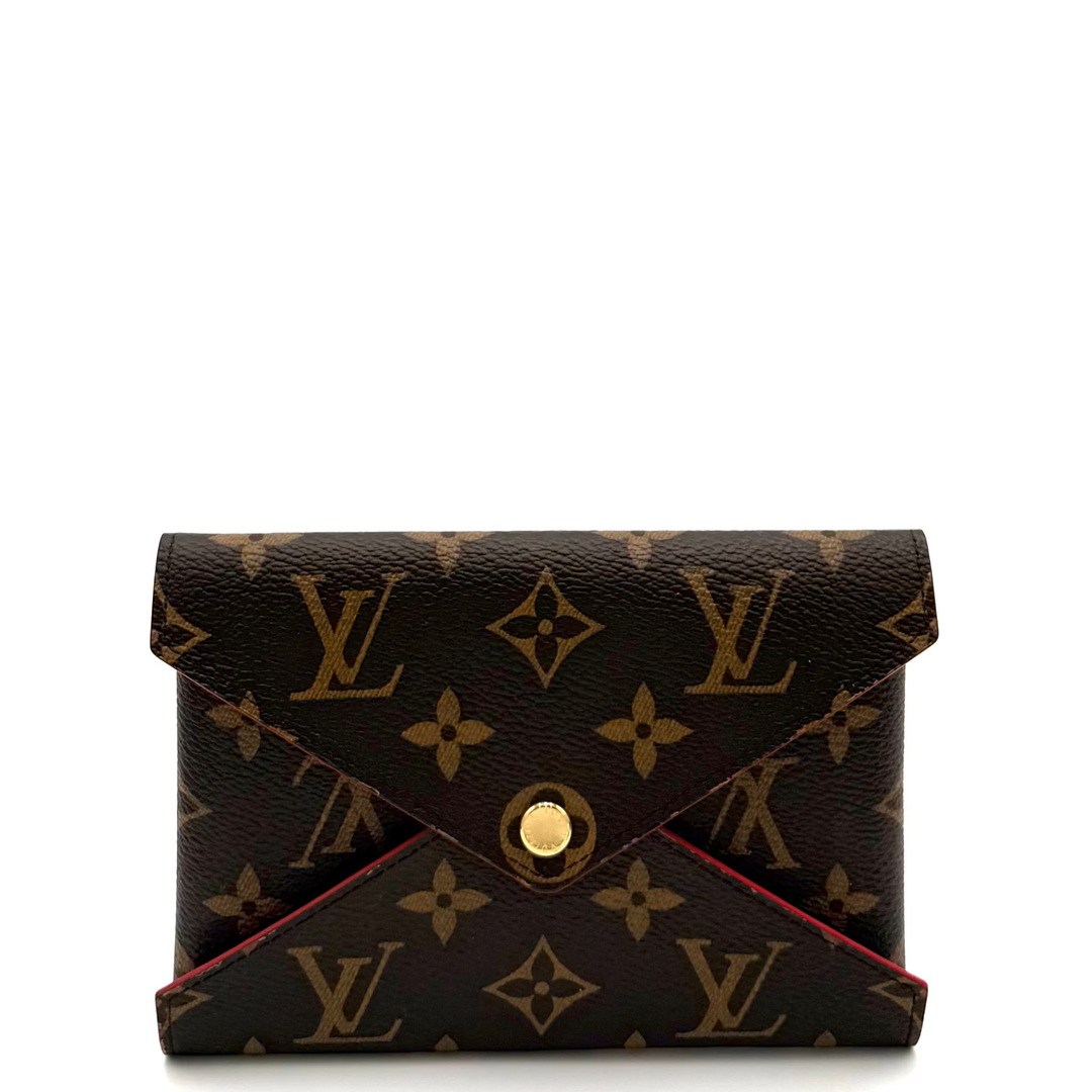 A Louis Vuitton monogram envelope wallet in dark brown coated canvas with gold-tone hardware, photographed on a white studio background.