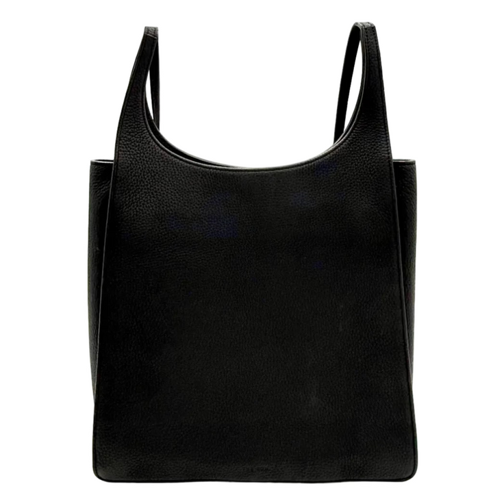 A black leather shoulder bag with a wide, curved top and double shoulder straps, photographed from directly below inside a clear light box with bright white studio lights.