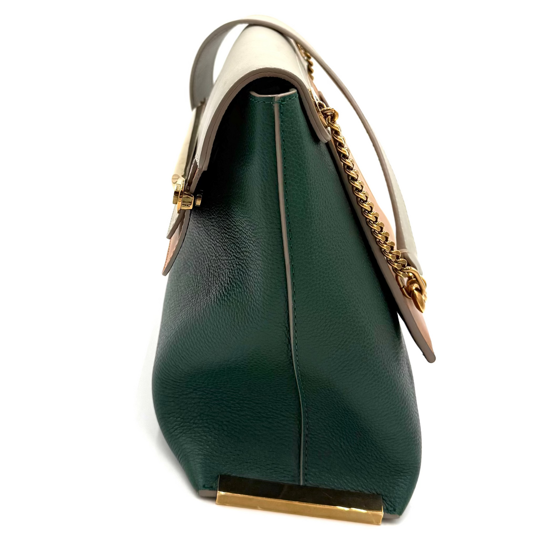 A dark green pebbled leather handbag with gold-tone hardware and a chain strap, shown from a side profile view on a white background.