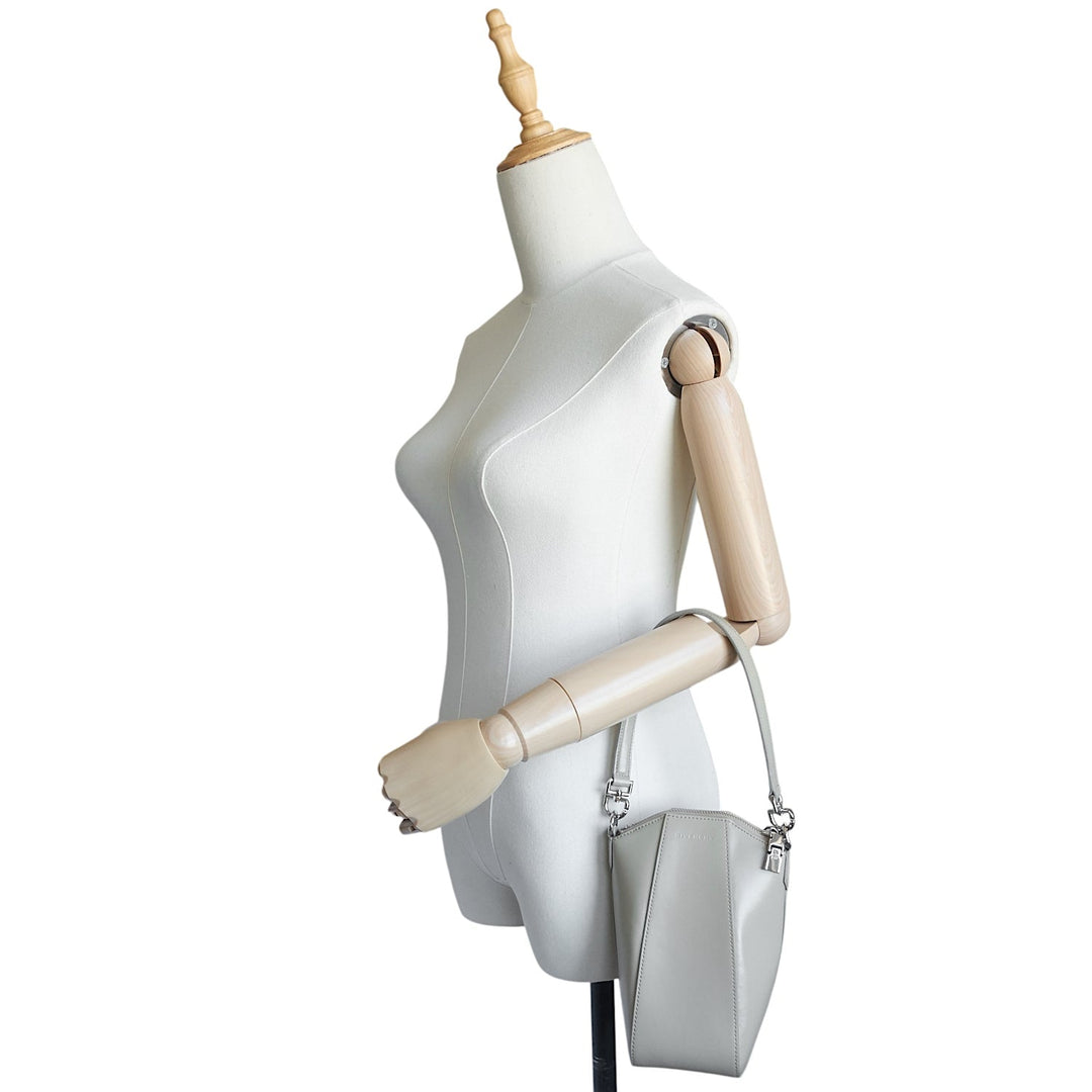 Mini Antigona Vertical Leather Crossbody Bag